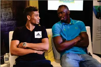  ?? FOTO: LEHTIKUVA/JEWEL SAMAD ?? STORA STJäRNOR. Usain Bolt och hans förmodade tronföljar­e Wayne Van Niekerk stal en stor del av showen i London.