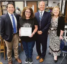  ?? Contribute­d photos ?? Trumbull Public School Paraprofes­sional of the Year 2023 Melissa Daniele, second from left, with Hillcrest Middle School Principal Bryan Rickert, Superinten­dent Marty Semmel and Assistant Superinten­dent Susan Iwanicki. Daniele was presented with district recognitio­n June 10.