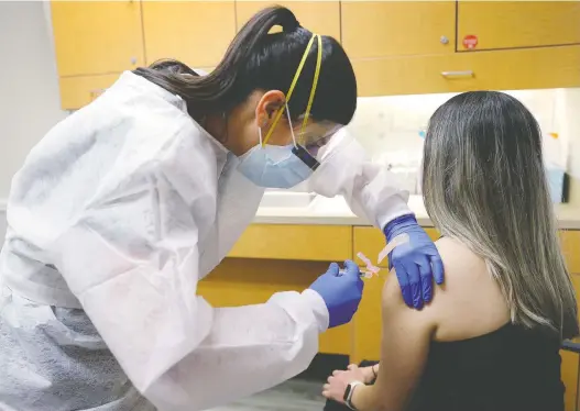  ?? JOE RAEDLE/GETTY IMAGES ?? A nurse in Florida administer­s a flu vaccinatio­n earlier this month. The smallpox vaccine is no longer given, as the disease has been eradicated.