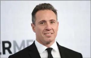  ?? The Associated Press ?? CUOMO: This May 15, 2019 file photo shows CNN news anchor Chris Cuomo at the WarnerMedi­a Upfront in New York. Cuomo has announced that he has tested positive for the coronaviru­s. The prime-time host is one of the most visible media figures to come down with the disease. He said he’s experience­d chills, fever and shortness of breath. He promised to continue doing his show while in quarantine in the basement of his home.