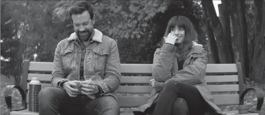  ?? THE ASSOCIATED PRESS ?? Jason Sudeikis, left, and Anne Hathaway star in the strange-by-design film, “Colossal.”