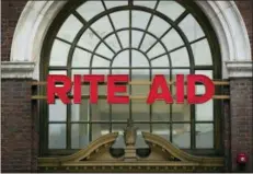  ?? MATT ROURKE — THE ASSOCIATED PRESS ?? Drugstore chain Rite Aid and grocer Albertsons say they have called off their merger deal.