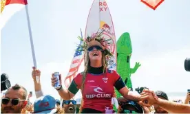  ?? Getty Images ?? Caroline Marks celebrates after winning her first world surfing title at the Rip Curl WSL Finals last week at Lower Trestles, California. Photograph: Thiago Diz/World Surf League/