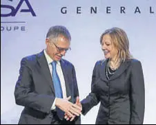  ?? REUTERS ?? PSA Group CEO Carlos Tavares (left) with GM CEO Mary Barra before a news conference, in Paris on Monday