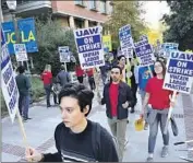  ?? Christina House Los Angeles Times ?? NEARLY 48,000 UC academic workers, including the ones above at UCLA on Monday, are on strike.