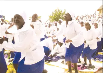  ?? — Picture by Tariro Kamangira ?? National Apostolic Faith Mission of the Holy Ghost church members dance celebratin­g the death and resurrecti­on of Jesus Christ on Good Friday in Skyline.