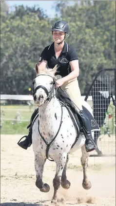  ??  ?? Having fun . . . Sabine Ware from the Cobram and District Equestrian Club enjoys the competitio­n.