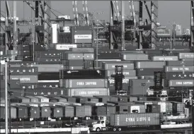  ?? TRIBUNE NEWS SERVICE FILE PHOTOGRAPH ?? Trucks line up at China Shipping in San Pedro at the Port of Los Angeles on Oct. 22, 2014.