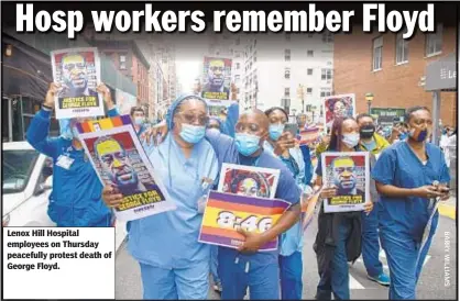  ??  ?? Lenox Hill Hospital employees on Thursday peacefully protest death of George Floyd.