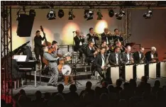  ?? Foto: Weinretter ?? The Uptown Jazz Orchestra traf im Audi Forum in Ingolstadt auf Sandro Roy. Die bo ten Emotionen, Spannung und Präzision.