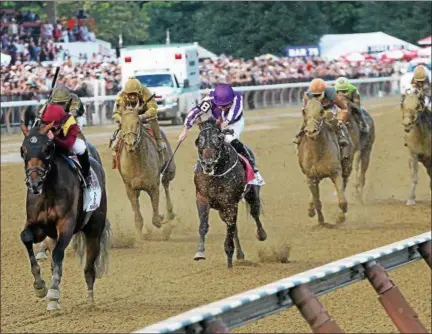  ?? PHOTO SPENCER TULIS/ FOR THE PINK SHEET ?? Javier Castellano guided Catholic Boy to a victory in the 149th Running of The Runhappy Travers a Grade I race worth $1, 250,000.