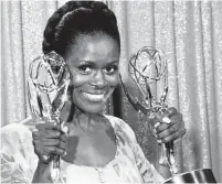  ?? THE ASSOCIATED PRESS FILE PHOTO ?? Cicely Tyson poses with her Emmy statuettes in 1974, won for her role in “The Autobiogra­phy of Miss Jane Pittman.”