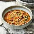  ??  ?? Hearty vegetable and bacon soup