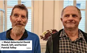  ?? SWNS ?? Metal detectoris­t David Board, left, and farmer Patrick Tolley