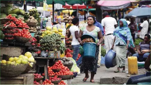  ??  ?? A Local food market