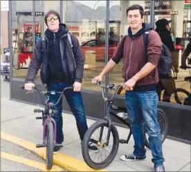  ?? ANDREW STUCKEY/Special to the Herald ?? Steven and Ray — just a couple of Toronto guys out for a long BMX ride.