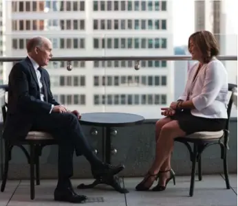  ?? NICK KOZAK/TORONTO STAR ?? A 32nd-floor balcony offers a bird’s-eye view of the city core for Tim Terceira, general manager of the Adelaide Hotel — soon to be St. Regis Toronto — and Kate Hay, COO of JCF Capital, which bought the former Trump Tower.