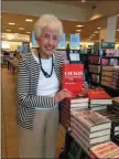  ?? SUBMITTED PHOTO ?? Eugenia O’Neill holding a copy of her son’s book at a Barnes & Noble store.