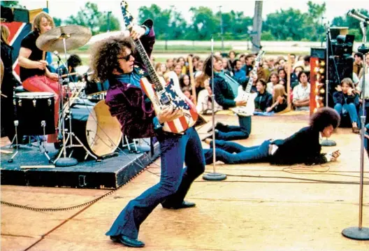  ?? LENI SINCLAIR GETTY IMAGES ?? The rock group MC5, comprising (from left) Dennis “Machine Gun” Thompson, Wayne Kramer, Fred “Sonic” Smith and Rob Tyner, performs in Michigan in 1969.