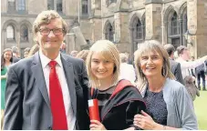  ??  ?? What’s up, doc Rachel (centre) at her graduation with dad William and mum Alison