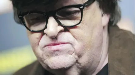  ?? THE ASSOCIATED PRESS ?? Michael Moore’s latest doc pushes back against both sides of the U.S. political system.