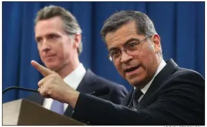  ?? AP/RICH PEDRONCELL­I ?? California Attorney General Xavier Becerra (right), responding to earlier tweets by President Donald Trump, urged Trump to “keep talking” as attorneys general build their case against his national emergency declaratio­n for border barrier funding. California Gov. Gavin Newsom (left) was the target of another Trump tweet over the state’s “failed Fast Train project.”