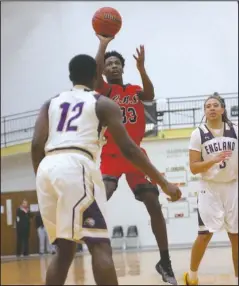  ?? The Sentinel-Record/James Leigh ?? EAGLE EYE: Cutter Morning Star sophomore forward Ke’Shawn Blevins (33) puts up a shot Friday during the Eagles’ 69-47 loss to England in the 2A-5 South district tournament final in Carlisle.