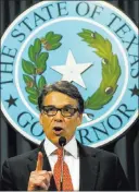  ?? RODOLFO GONZALEZ/ THE ASSOCIATED PRESS ?? Texas Gov. Rick Perry said Saturday in Austin that the indictment against him for abuse of power was itself an “outrageous” abuse of power.