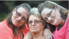  ?? JACK GRUBER/USA TODAY ?? George Shaw left wife, Norma, center, and daughters Mary, left, and Linda. Norma says George was “trapped in his body” when Reta Mays gave him insulin.