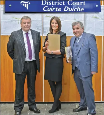  ??  ?? Fiona Gallagher solicitor who was welcomed to Tubbercurr­y District Court on Wednesday with her father Declan and uncle Eamonn. Fiona is the third generation of the Gallagher solicitor family. Pic: Tom Callanan.