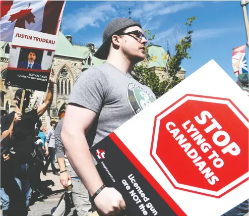  ?? / THE CANADIAN PRESS FILES ?? The Canadian Coalition for Firearm Rights organized a September 2020 protest against the new gun regulation­s
rolled out by Prime Minister Justin Trudeau. Let’s use Jan. 6 as a teachable moment, two MPS write.