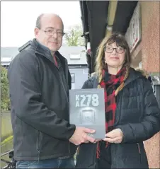  ?? ?? Graham Chappell and Heather Macleod, co-hosts of the What’s Happening On Arran show, with a copy of the new anthology of Arranspeci­fic stories, KA278.