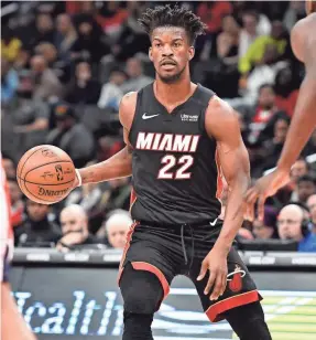  ?? BRAD MILLS/USA TODAY SPORTS ?? Jimmy Butler and the Heat rise just about to the top of the uniform standings.