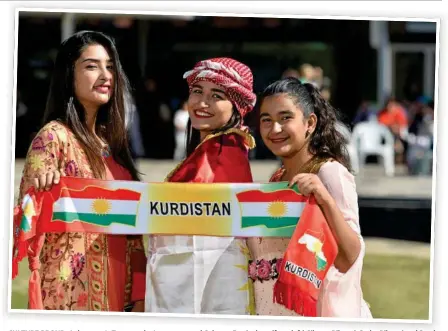  ?? Photo: Kevin Farmer ?? CULTURE PROUD: At last year’s Toowoomba Languages and Cultures Festival are (from left) Silvana Rihanai, Sedra Rihanai and Sandra Rihanai. The festival is on again in Queens Park tomorrow.