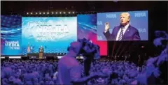  ?? TAMIR KALIFA/THE NEW YORK TIMES ?? President Donald Trump speaks at the National Rifle Associatio­n convention in Dallas on Friday.