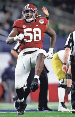  ?? GETTY IMAGES ?? Alabama defensive lineman Christian Barmore is a possible fit for the Green Bay Packers at the bottom of the first round.