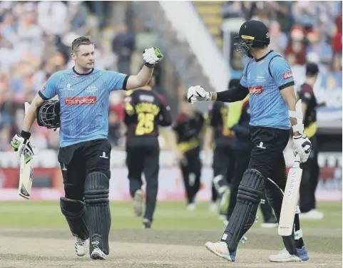  ?? Picture: Stephen Lawrence ?? Luke Wright and David Wiese celebrate a fine partnershi­p against Somerset last time Sussex got to finals day, in 2018