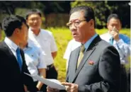  ??  ?? North Korea’s ambassador to Malaysia Kang Chol, speaks to media Monday outside the North Korean Embassy in Kuala Lumpur, Malaysia. Security camera footage obtained by Japanese television appears to show a careful and deliberate attack last week on the...