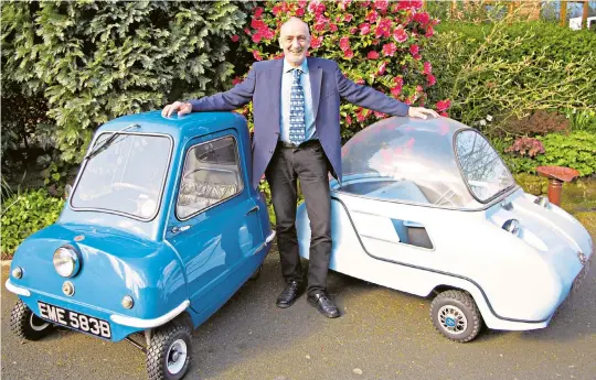  ??  ?? g Andy Carter is a microcar enthusiast who now owns four such vehicles; pictured here with a Peel P50, on the left, and a Trident