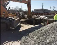  ?? EVAN BRANDT — MEDIANEWS GROUP ?? Soil is removed from above a water main break along Manatawny Creek and adjacent to the King Street bridge Friday in preparatio­n for repairs.