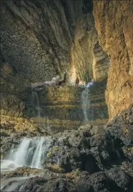  ?? PROVIDED TO CHINA DAILY ?? An undergroun­d river deep inside Guanyin Cave has become an attraction.