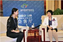  ??  ?? Quan Ruixian gives an interview during the 12th China Scientists Forum.