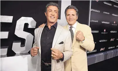  ?? ERIC CHARBONNEA­U/INVISION FOR LIONSGATE/AP ?? Sylvester Stallone and Frank Stallone arrive at the Lionsgate Los Angeles premiere of “The Expendable­s 3” in August 2014 in Hollywood.