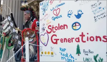  ?? The Canadian Press ?? A procession makes its way onto the Alberta Legislatur­e steps after Alberta Premier Rachel Notley apologized to survivors and families of the Sixties Scoop in Edmonton on Monday.