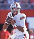  ?? JOSHUA A. BICKEL/COLUMBUS DISPATCH ?? Ohio State QB C.J. Stroud delivered 330 yards and five TDS against Rutgers, which could keep him in contention for postseason honors.