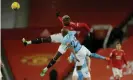  ??  ?? Paul Pogba wins a header against Manchester City. He is competing more in the air this season. Photograph: Tom Jenkins/The Guardian