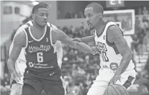  ??  ?? Brandon Jennings (right) has played in seven games with the Wisconsin Herd.