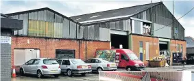  ?? Pictures: Andrew Forgrave ?? ● British Wool says the Porthmadog Wool Depot in Madog Street, above, will close in February 2021; wool bags are winched to the wool graders at the depot, right