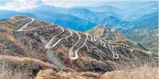  ?? /123RF ?? Peak power: Roads curve beautifull­y along a stretch of what used to be the Silk Road in the mountains between China and Sikkim in India.