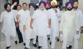  ?? HT PHOTO ?? Shiromani Akali Dal chief Sukhbir Singh Badal with other party legislator­s at the Punjab Vidhan Sabha in Chandigarh on Monday.